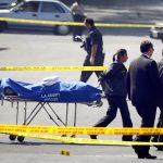 The coroner’s office remove the body of an offduty Los Angeles County sheriffs deputy who works in